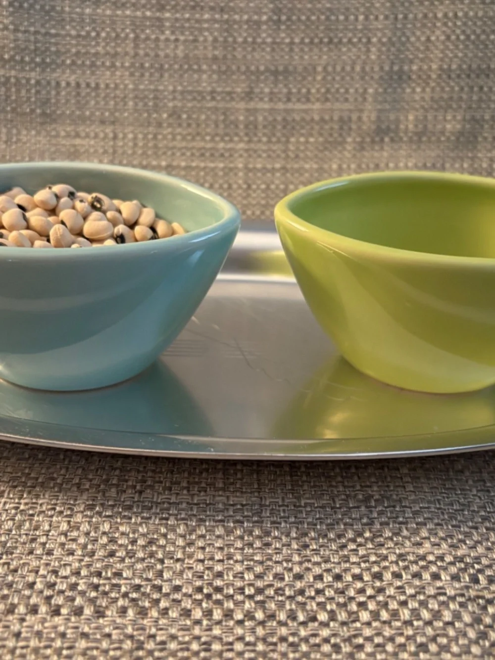 children's house lesson pouring 1:1 with ceramic mugs by idlewild montessori